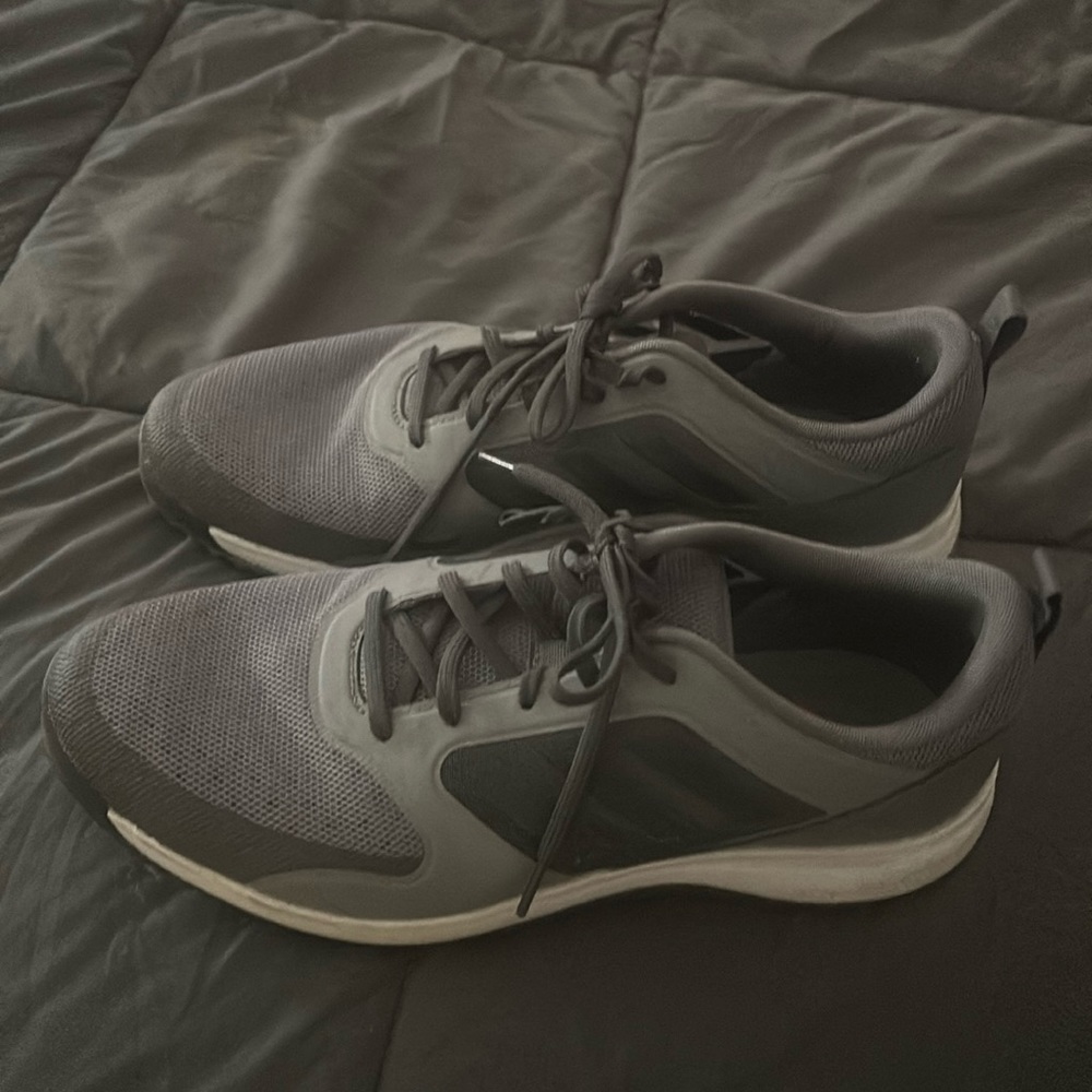Lightly used men’s grey Adidas golf shoes - size 11